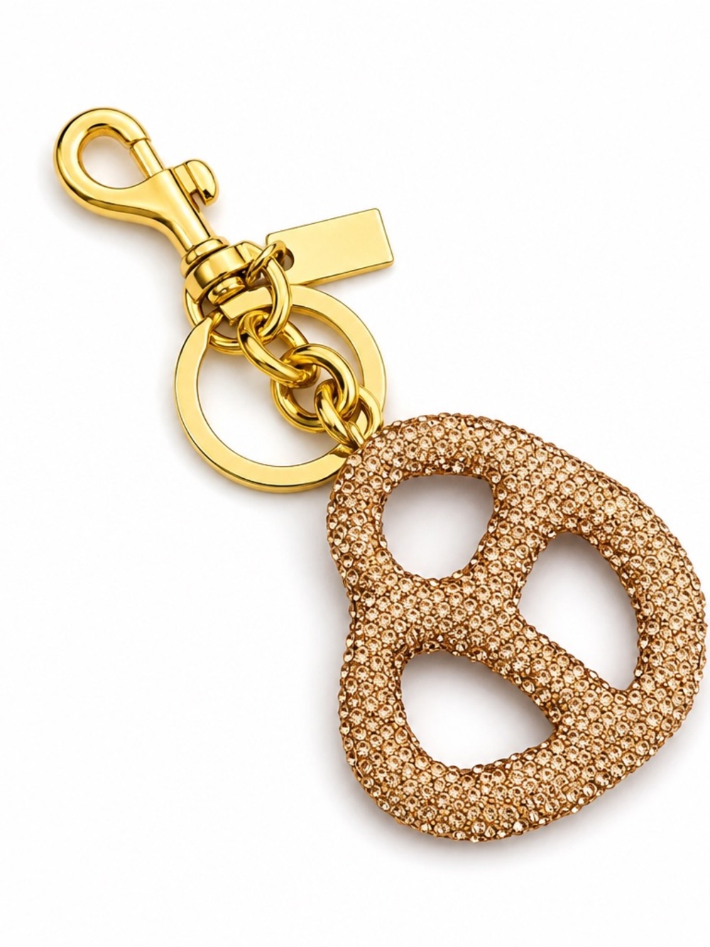 Coach Gold-Tone Crystal Pretzel Key Charm in Rose Gold Crystal